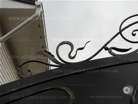 Forged gate decorative elements 