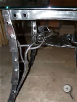 Forged decorative details of table